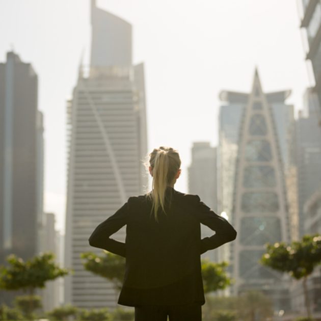 Confident Professional Woman looking at cityscape