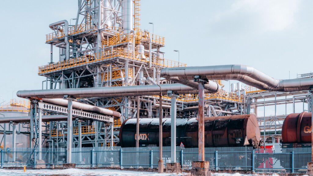 Pipework, columns and rail tank wagons at an onshore refinery